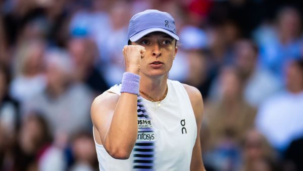 Swiatek makes Open Era history at Australian Open