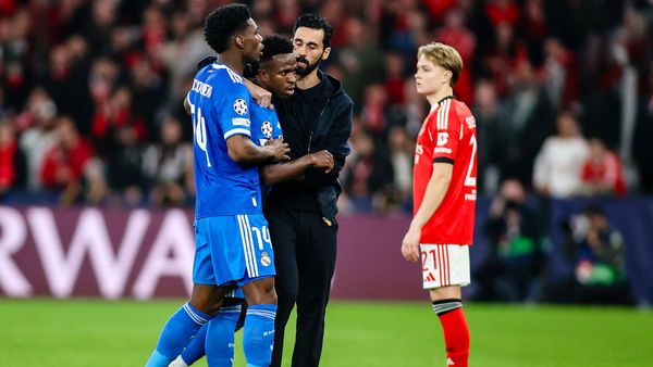 Vinicius seals Madrid win in chaotic Benfica