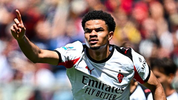 Milan beat Genoa to boost CL hopes