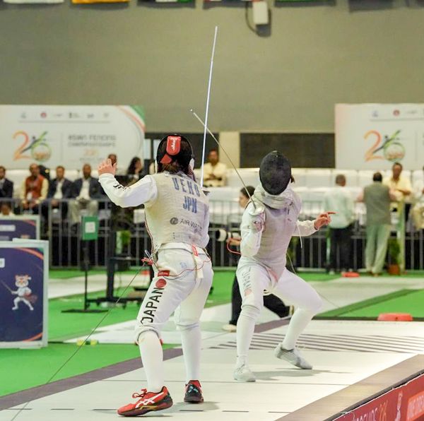 Fencer celebrates victory at Asian Fencing Championships in Delhi