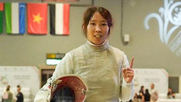 Fencer celebrates victory at Asian Fencing Championships in Delhi