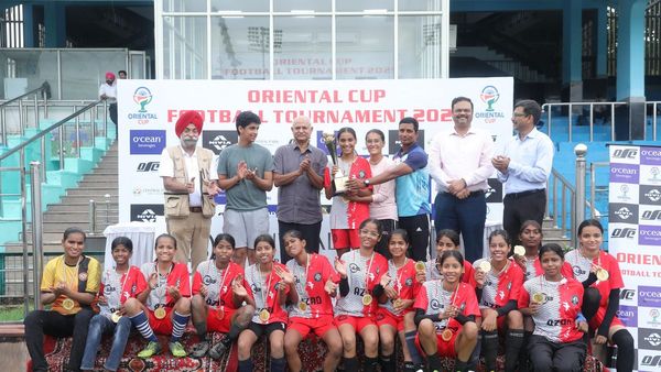 Young students competing in the Oriental Cup football tournament Young students competing in the Oriental Cup football tournament