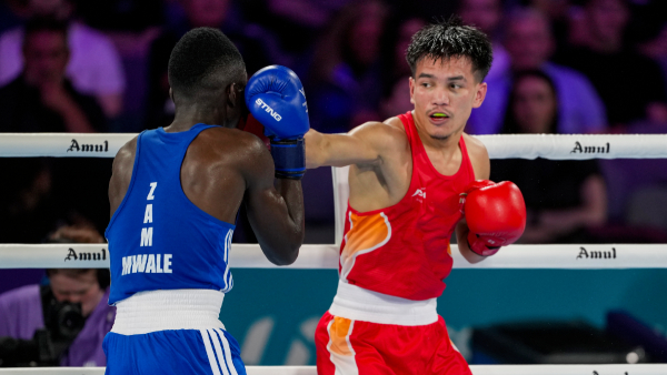 Jadumani Singh red punches Zambia s Mwengo Mwale during the Men s 55kg quarter-final boxing bout at the Commonwealth Games 2026