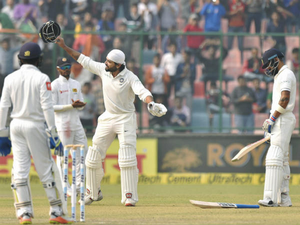 Record breaking Kohli, solid Vijay punish Sri Lanka 