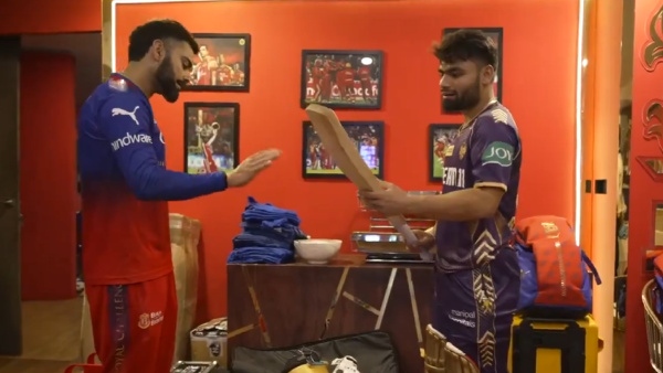 IPL 2024 Virat Kohli Gifts Bat To Rinku Singh After RCB vs KKR Match