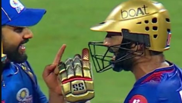 MI vs RCB IPL 2024 Rohit Sharma Sledges Dinesh Karthik with T20 World Cup Remark Video Goes Viral