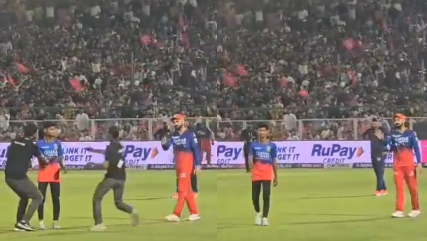 Virat Kohli won fans Heart by asking the Security Guards to Be Gentle with the Pitch Invader