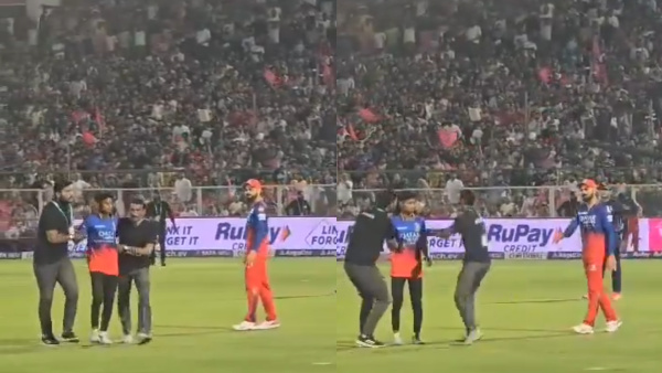 Virat Kohli won fans Heart by asking the Security Guards to Be Gentle with the Pitch Invader