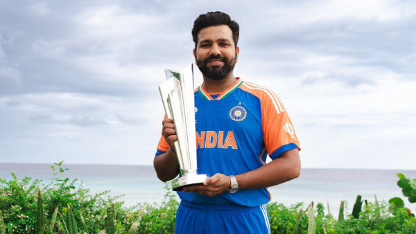 Three hands on Rohit Sharma shoulders Photo