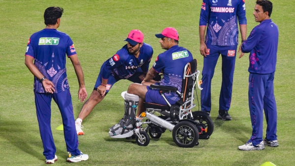 Rahul Dravid Attends RR vs KKR Match in Wheelchair After Injury Meets KKR Players