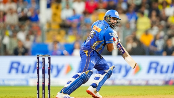 Rohit Sharma Shines with Classic Half-Century Crosses 12 000 T20 Runs in Style