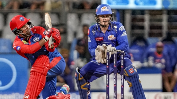 Suryakumar Yadav s Unbeaten Fifty Santner s Bowling Masterclass Propel Mumbai Indians to Playoffs
