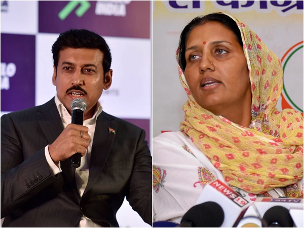 രാജ്യവര്‍ധന്‍ സിങ് റഥോഡും കൃഷ്ണ പൂണിയയും