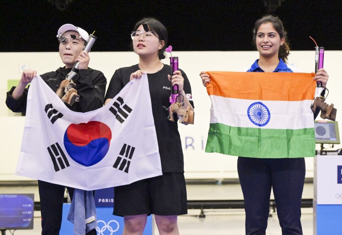 Chateauroux: Gold Medallist Korea’s Jin Ye Oh with her silver medallist compatriot Kim Yeji and bronze medallist India's Manu Bhaker after the 10m Air Pistol Women's Final event at the Summer Olympics 2024