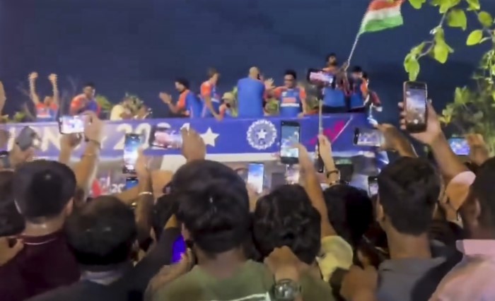 Mumbai: Players of the T20 World Cup-winning Indian cricket team acknowledge fans during their open bus victory parade, in Mumbai, Thursday, July 4, 2024