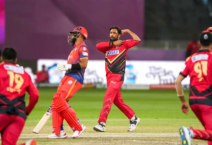 Amir Immitating Gulbadin after taking his wicket.