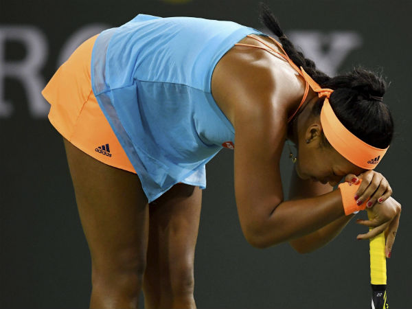 கலவரத்துக்கு நடுவே வென்ற ஒசாகா