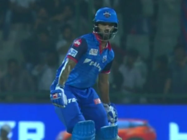 தலையை ஆட்டி..