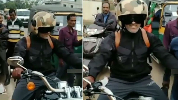 வீட்டு வாசலில் பைக்கை நிறுத்திய தோனி 