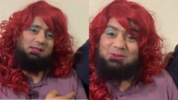 தலையில் பிங்க் விக் 