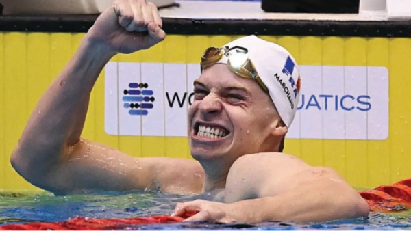 French Star Swimmer Leon Marchand breaks the Michael Phelps World Record in 400 M Medley French Star Swimmer Leon Marchand breaks the Michael Phelps World Record in 400 M Medley