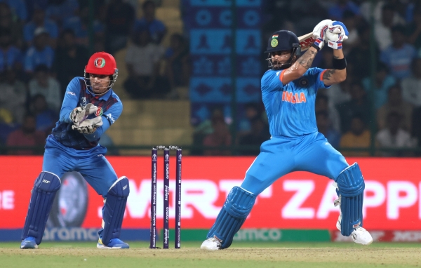 Virat kohli fans trolls rohit sharma for scoring against afghanistan