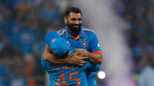 Ravichandran Ashwin kisses the hand of Mohammad Shami after the 7 Wicket haul against New Zealand in ICC 50 over world cup 