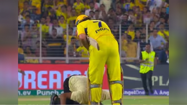 IPL 2024 CSK vs GT Fan touches MS Dhoni feet at Ahmedabad Stadium during the Match between CSK and Gujarat
