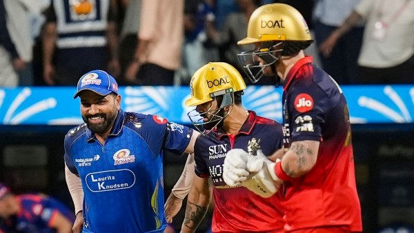 MI vs RCB Phil Salt Rajat Patidar Virat Kohli Dismantle Mumbai Bowling to Set a Mammoth 241-Run Target