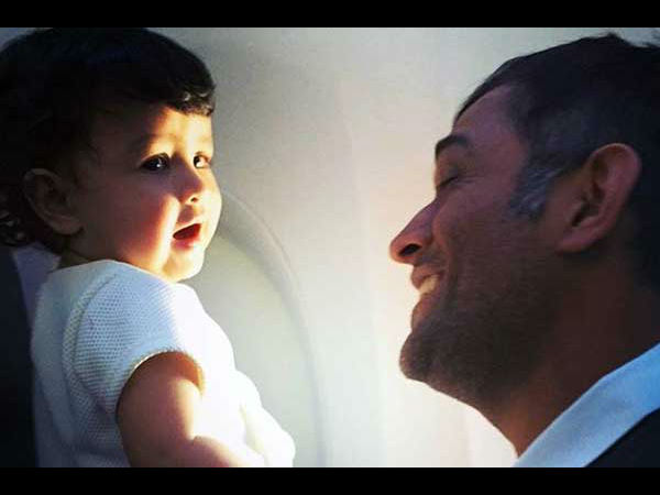 dhoni with baby