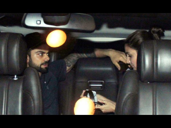  Virat Kohli kissing Anushka Sharma at Mumbai Airport 