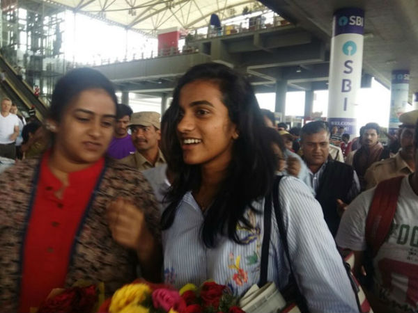pv sindhu, saina and pullela gopichand arrived hyderabad 