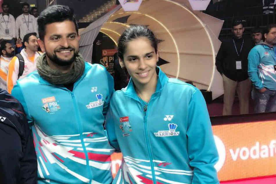 Suresh Raina cheers for Saina Nehwal during Awadhe Warriors match Suresh Raina cheers for Saina Nehwal during Awadhe Warriors match
