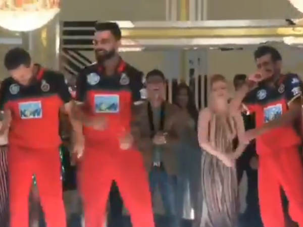 కోహ్లీ డ్యాన్స్ చూసిన నవ్వు ఆపుకోలేక పోయిన చాహల్