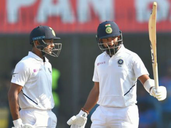 పుజారా హాఫ్ సెంచరీ