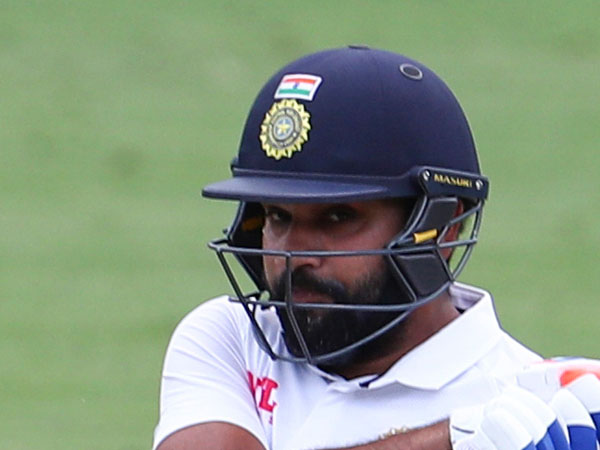 హెల్మెట్‌ పెట్టుకొని