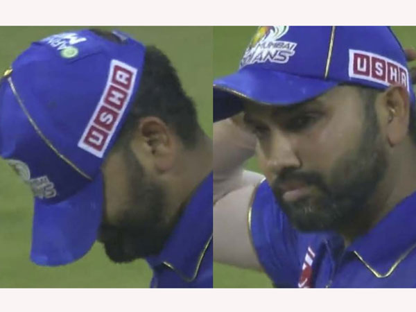 Rohit Sharma Covers Face