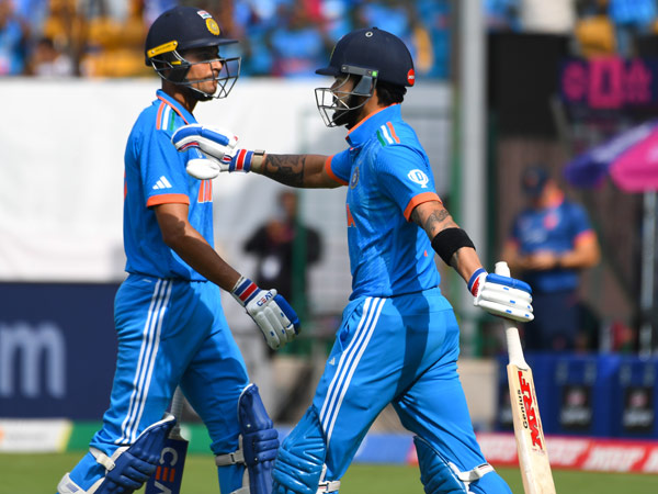 Indias Shubman Gill walks back after his dismissal as Virat kohi walks in to bat Indias Shubman Gill walks back after his dismissal as Virat kohi walks in to bat