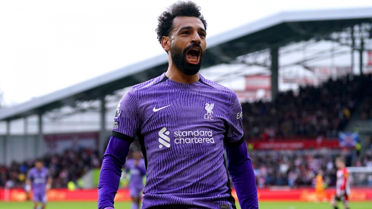 Mohamed Salah celebrates scoring on his Liverpool return