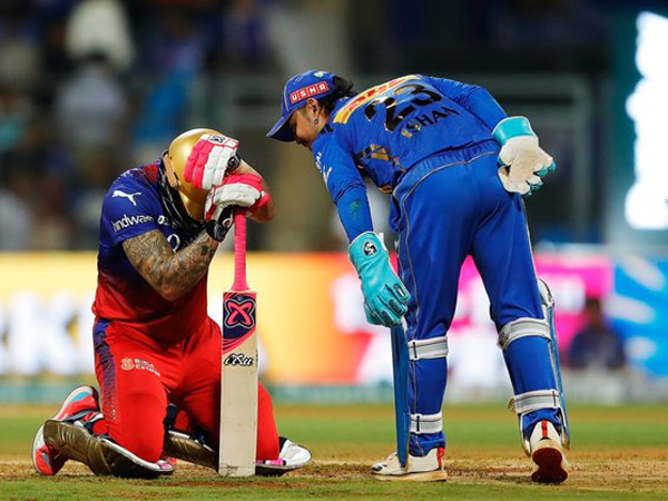 MI vs RCB Ishan Kishan teasing Faf Du Plessis after ball hit on the abdomen guard