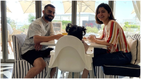 Watch Virat Kohli Shares Family Moments Vamika Enjoys Swinging the Bat