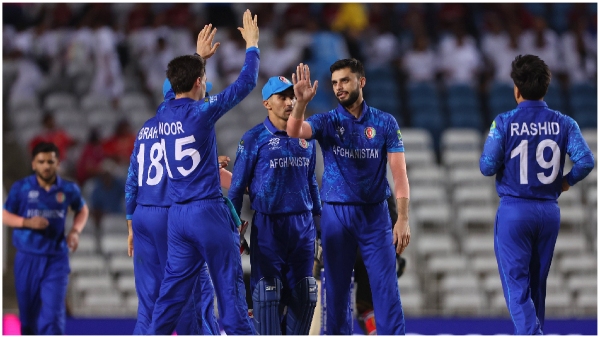 T20 World Cup Afghanistan Secures Super-8 Spot with Dominant Victory Over Papua New Guinea