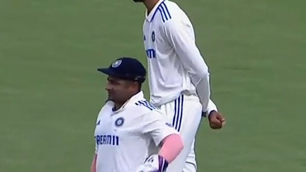 IND vs PM XI Rohit Sharma Punches Sarfaraz After He Dropped Easy Catch In Practice Match Video