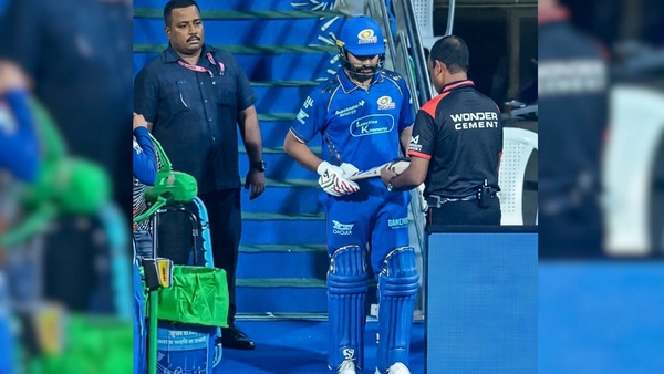 Just Hitman Things Rohit Sharma Teaches Umpire How to Check Bat Size as Viral Video Sparks Buzz Just Hitman Things Rohit Sharma Teaches Umpire How to Check Bat Size as Viral Video Sparks Buzz