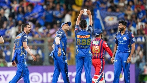 IPL 2026 Mumbai Indians s Raghu Sharma Celebrates Maiden Wicket with Viral Jai Shri Ram Note