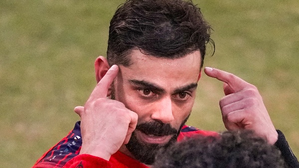Virat Kohli Touching his childhood Coach Rajkumar Sharma s feet and says he taught me how to bat